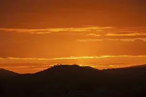 Sunset In Southern Europe Prints: Orange sunset, hill in backlight
