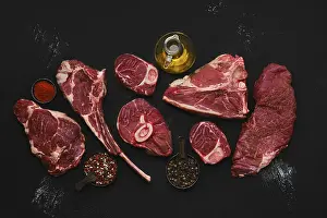 Close Up View Of Meat Prints: Overhead composition with raw prime beef cuts
