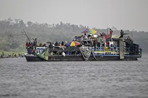 Prints of Overloaded ferry on the Congo River, near Tshumbiri, Mai-Ndombe Province, Democratic Republic of the Congo Related Prints: Overloaded Ferry Print, Congo River, Democratic Republic of the Congo