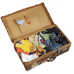 Deserted Holiday Scene Prints: Packed suitcase