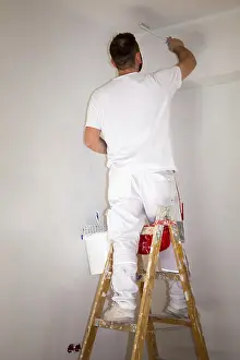 Old Building Restoration Prints: Painter renovates an old flat