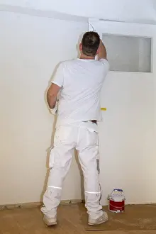 One Person Construction Team Prints: Painter renovates an old flat