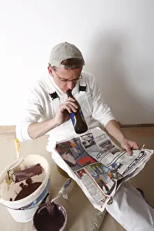 Man Reading Newspaper Prints: Painter taking a break