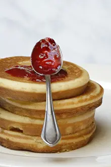 Deserted Bakery Products Prints: Pancake with raspberry jam and spoon