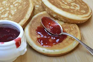 Deserted Bakery Products Prints: Pancake with raspberry jam and spoon