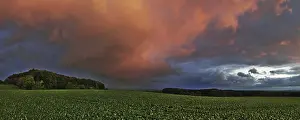 Deserted Evening Landscape Prints: Panorama of storm clouds in the sunset