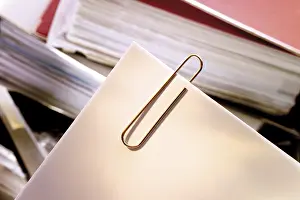 Office Supply Prints: Paperclip, paper clips in front of a stack of files