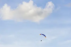 Extreme Sport Germany Prints: Paraglider in front of cloudy sky