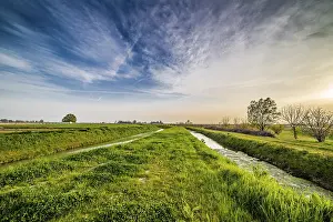Rural Agriculture Photography Prints: Two parallel irrigation canals run through the fields in the countryside of Romagna