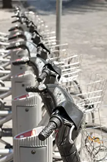 Deserted Parking Lot Prints: Parking for bikes close up