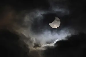 Central Europe Cloudy Skies Prints: Partial solar eclipse, thin cloud cover