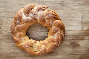 Empty Bakery Display Case Prints: Pastry in the shape of a braid from dough