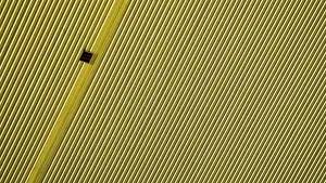 Modern Building Background Prints: Pattern orange wall of a modern building abstract background