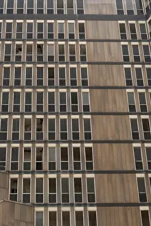 Deserted Urban Architecture Prints: A pattern of windows of an abandoned high rise building