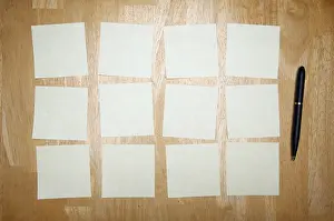 No People Background Image Prints: Pen and post it notes pad against a wood background