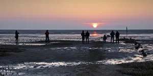 Northern Germany Coastline Photo Prints: People looking at the sunset, mudflat