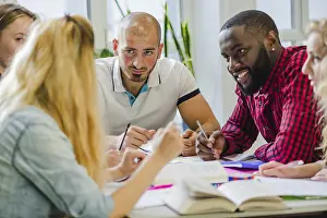 Office Work Environment Prints: People table studying sharing ideas