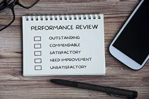 Performance Appraisal Checklist Prints: Performance appraisal checklist on notepad with with office setting background