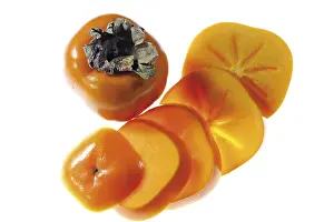 Freshly Sliced Fruits Prints: Persimmon, whole and sliced