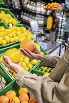 Fresh Fruit Selection Prints: Person's hands holding