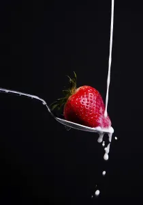Nutrition Facts Fruit Prints: A piece of fruit in a spoon milk dropping