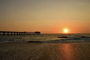 Prints of Pier at sunset over the Atlantic, Swakopmund, Namibia Swakopmund Prints: Pier at Sunset Print, Swakopmund, Namibia