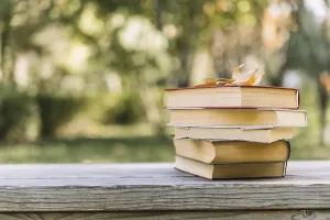 Deserted Library Prints: Piled books table