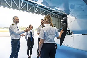 Aircraft Maintenance Prints: Pilot instructor explaining airplane propeller