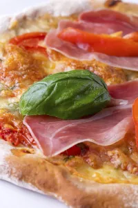 Close Up Pizza Prints: Detail of a pizza with ham and basil