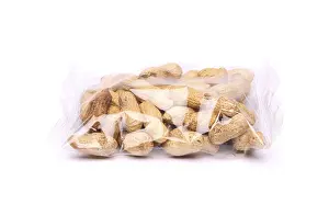 Plain White Background For Copy Space Prints: Plastic bag of peanuts on the white background