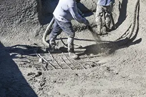 Construction Site Labourer Prints: Pool construction worker shooting concrete