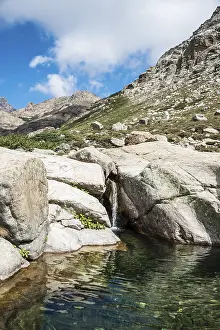 Corsica Waterfall Prints: Pool with a small waterfall in the mountains