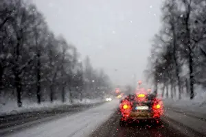 Bad Weather In Europe Prints: Poor visibility through the windshield in rain and snow