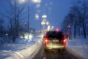 Deserted Roads Germany Prints: Poor visibility through the windshield in rain and snow