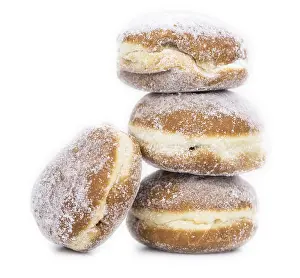 Plain Colored Backgrounds Prints: Portion of Berliner Doughnuts isolated on white background (selective focus)