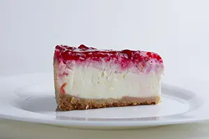 Decorative Still Life Prints: Portion of cherry cheesecake on a plate