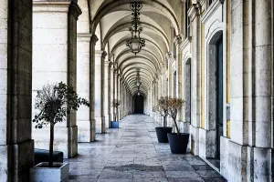 Empty European Squares Prints: Arcade around Praca do Comercio