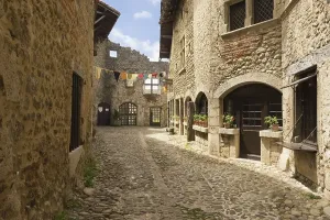 Uninhabited Stone Houses Prints: Cobblestone street, medieval walled town of Perouges