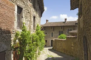 Medieval European Fortresses Prints: Cobblestone street, medieval walled town of Perouges