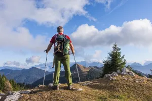 Backpacker In Nature Prints: Hiker with backpack is stand on mountain top