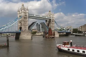 Bascule Bridge Architecture Prints: A junk passing through the opened bascules of Tower Bridge