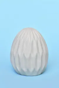 Traditional Easter Ornamentation Prints: Single Easter egg with honeycomb pattern on blue background