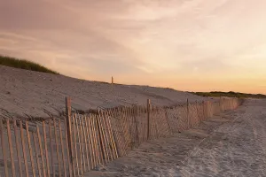 Evening Sun On The Shore Prints: Sunset on the empty beach, Cape Cod