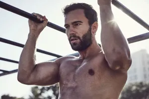 Young Fitness Model Prints: Young man training, pulling up