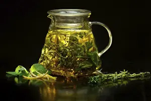 Fruit Tea Prints: Pot with fruit tea on black background