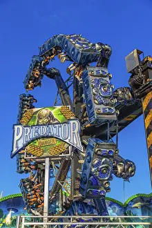 Oktoberfest Amusement Ride Prints: Predator overhead ride in motion