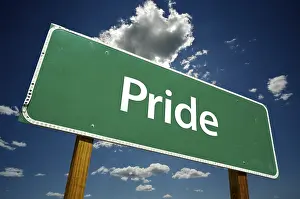 Dramatic Clouds Sky Prints: Pride road sign with dramatic clouds and sky