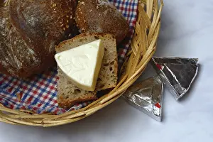 Dairy Product Still Life Prints: Processed cheese, cheese wedges and bread in baskets
