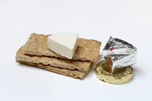 Plain Colored Background Food Images Prints: Processed cheese on crispbread, opened and packed