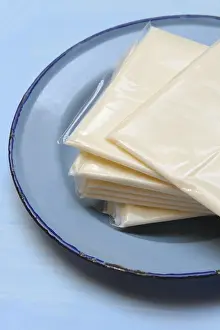 Plastic Wrapped Cheese Prints: Processed cheese, processed cheese slices packed in plastic